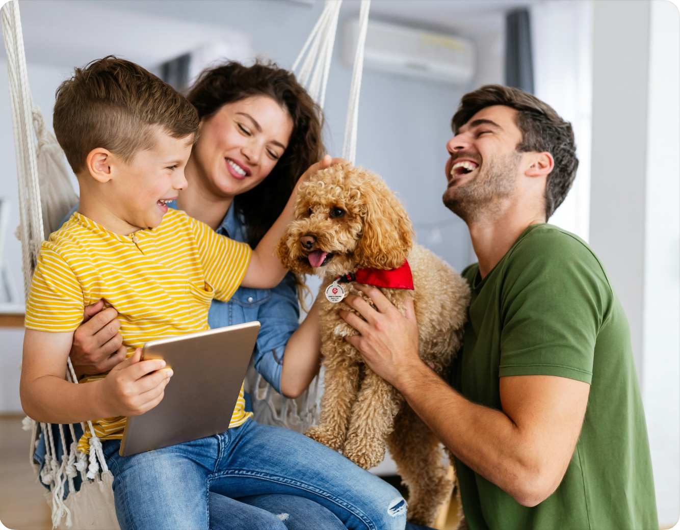 Happy family with their pet dog